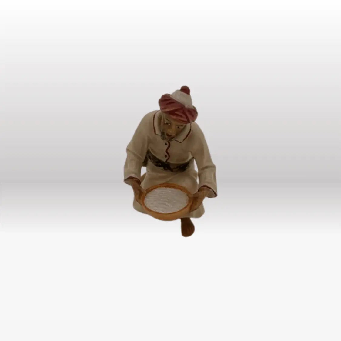 Kameltreiber kniend mit Schüssel von Kostner-1