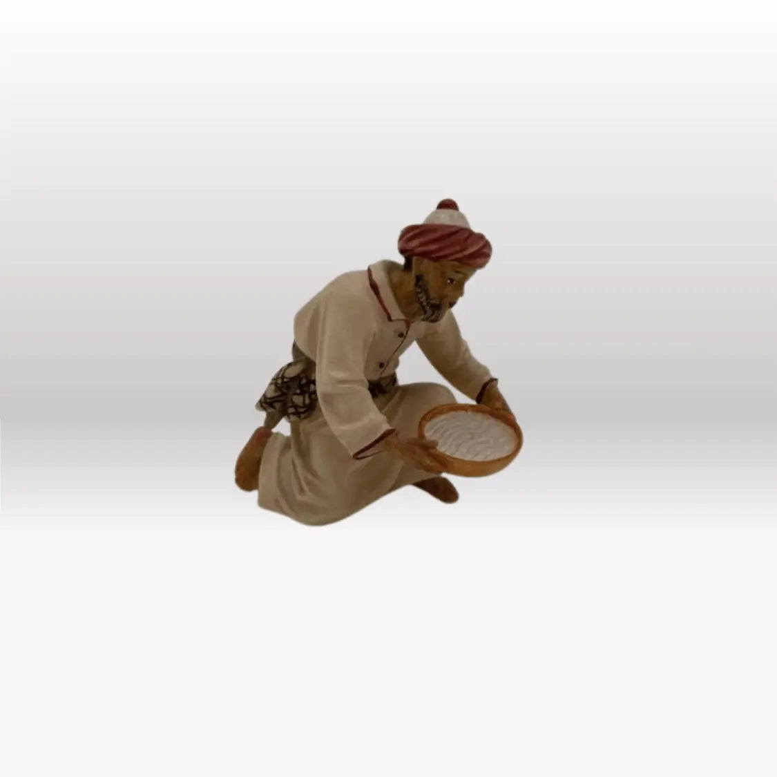 Kameltreiber kniend mit Schüssel von Kostner-2