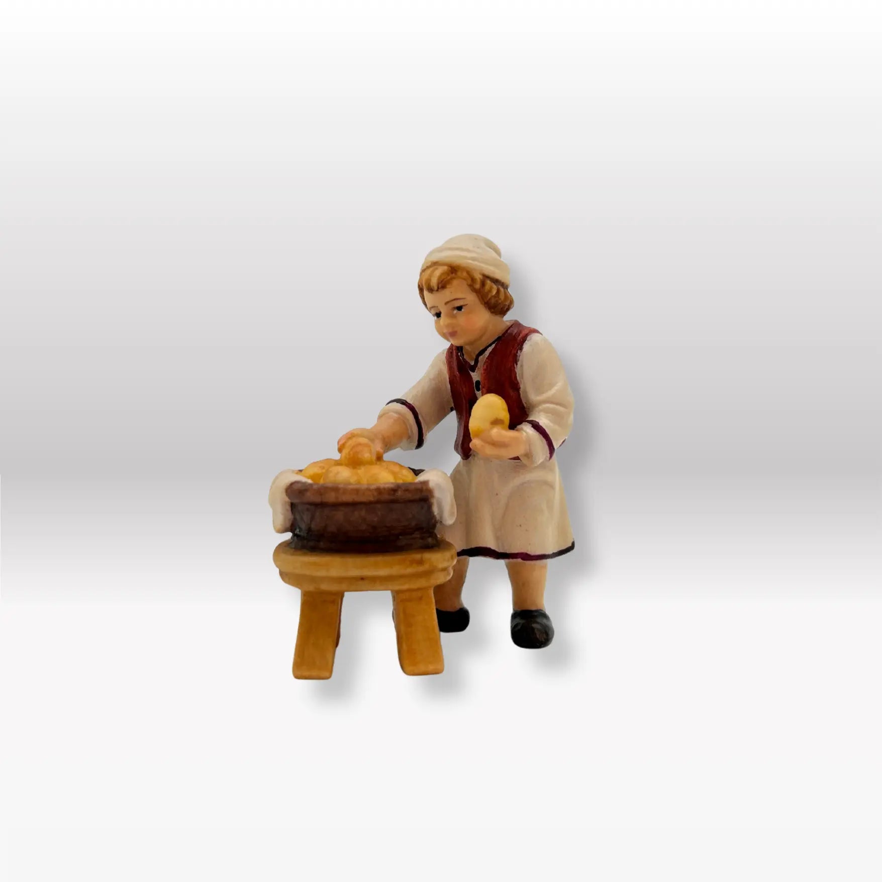 Bub mit Brotkorb von Kostner
