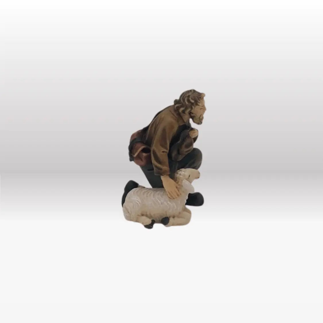 Hirte kniend und Schaf von Kostner-2